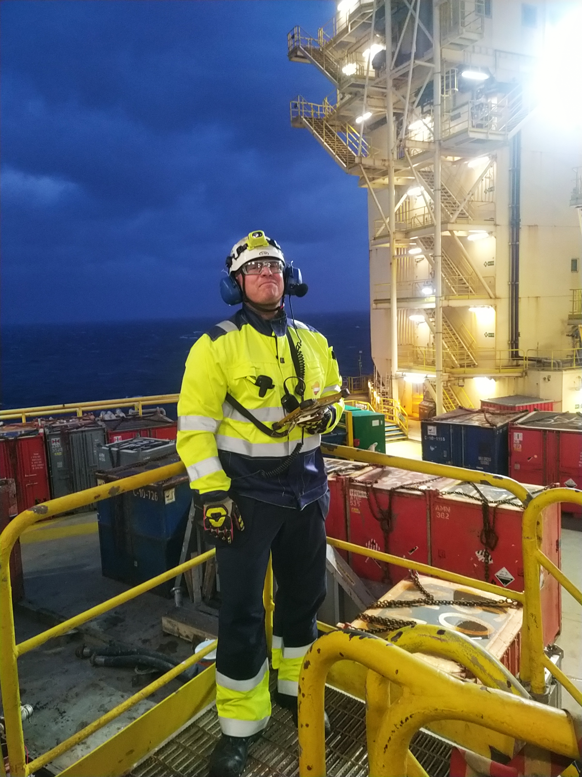 Tommy Eriksson finds working with technology an interesting part of fieldwork. Here he is using the digital fieldwork application on the Yme platform in the North Sea. Photo: Beerenberg.