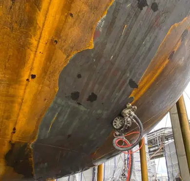 Robotic surface treatment of industrial tanks